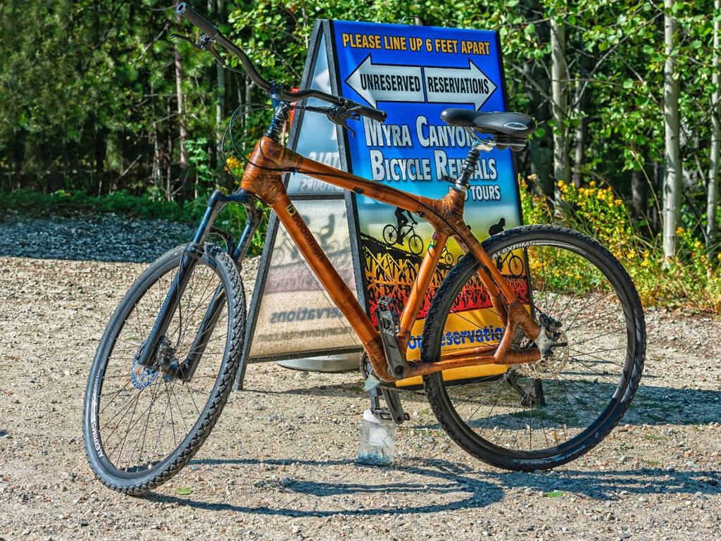 Orange bicycle of Myra Canyon Rental bikes